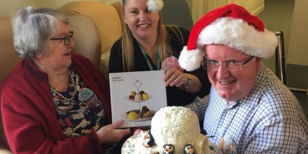 Resident at Apthorp care centre with regional directors