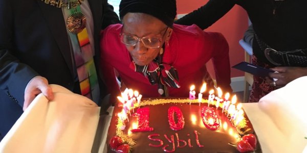 Sybil blowing out candles