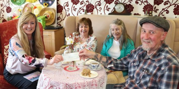 Art Group donating cheque to care home, Carey Lodge