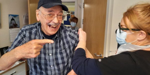 Malcolm, our Resident at Sir Aubrey Ward receives his vaccination