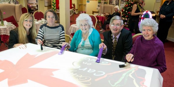 Residents using OMI Mobii interactive projector