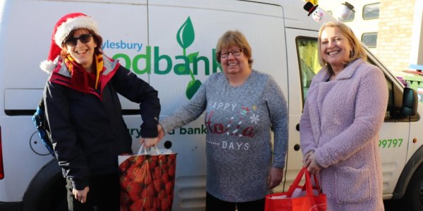 Lucy and Carey from The Fremantle Trust donating to Aylesbury Food bank