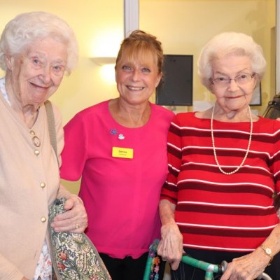 Denise with two residents in her salon