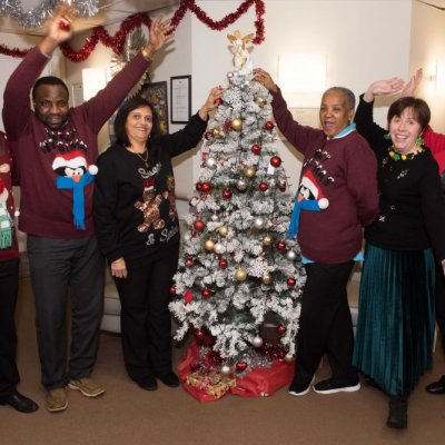 Team at Apthorp Care Centre wearing christmas jumpers