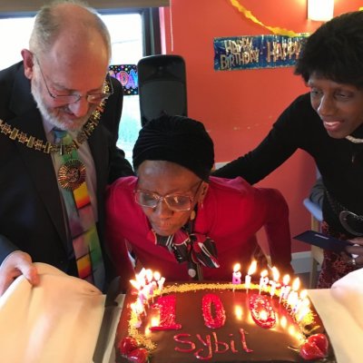Sybil blowing out candles