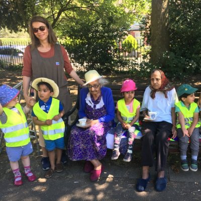 Group of children and residents smiling