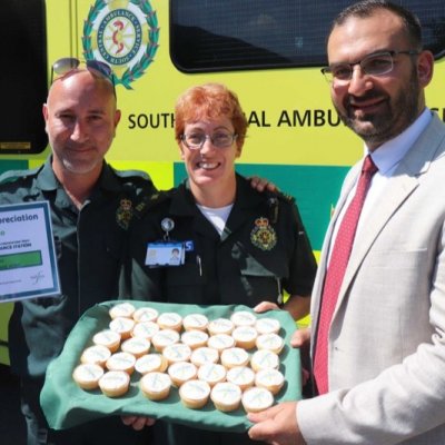 Ambulance staff with home manager Antonios