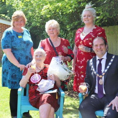 Joan celebrating her 100th birthday with friends, family and the Mayor of Princes Risborough