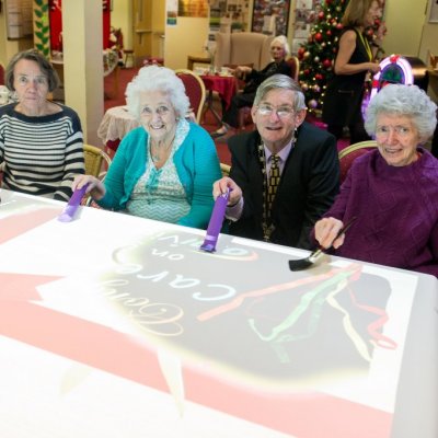 Residents using OMI Mobii interactive projector