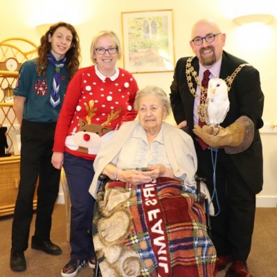 Resident,scout and Mayor of Aylesbury holding an owl