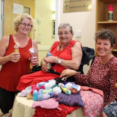 Residents and Age UK CEO and The Fremantle Trust CEO smiling at camera