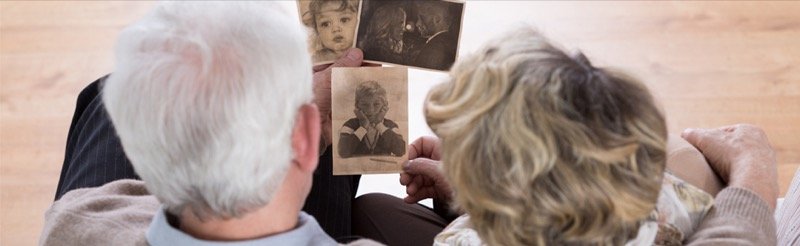 Couple looking at old photos